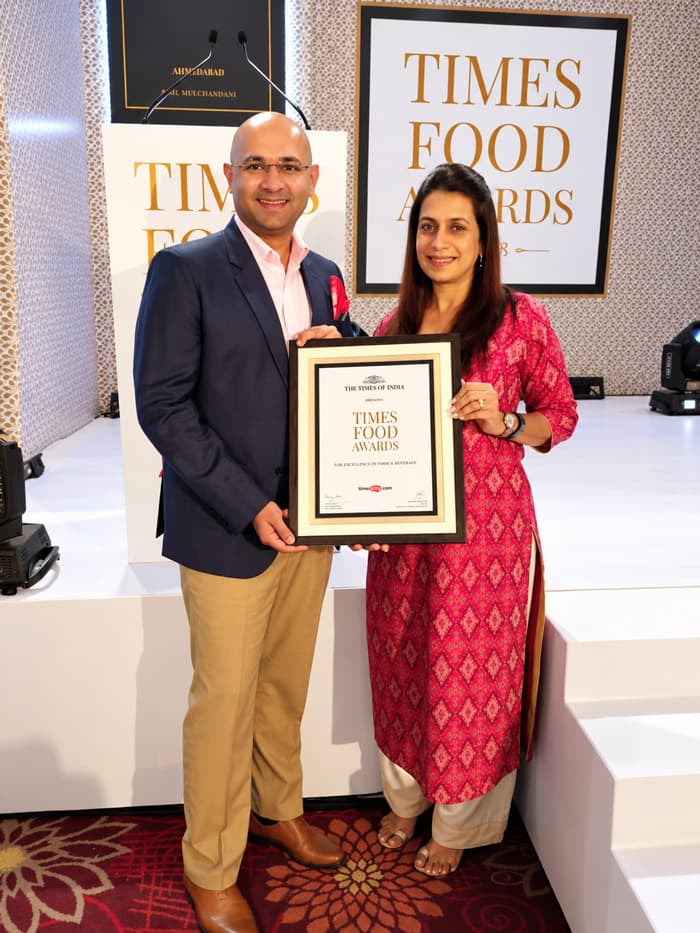 WeServe founders accepting the Times Food Award for Excellence in Food & Beverage