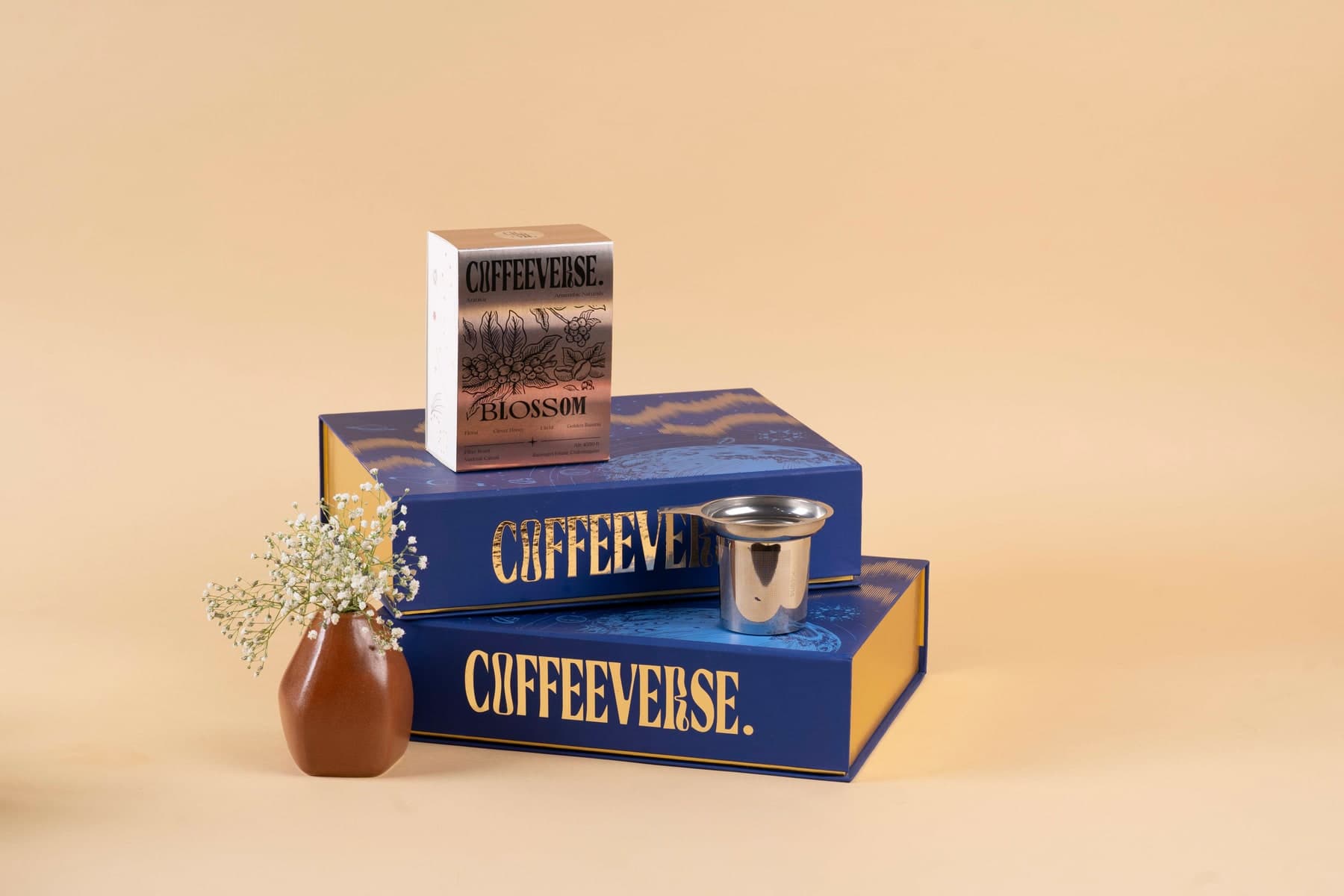 Coffeeverse blue gift boxes with a cup and coffee packaging