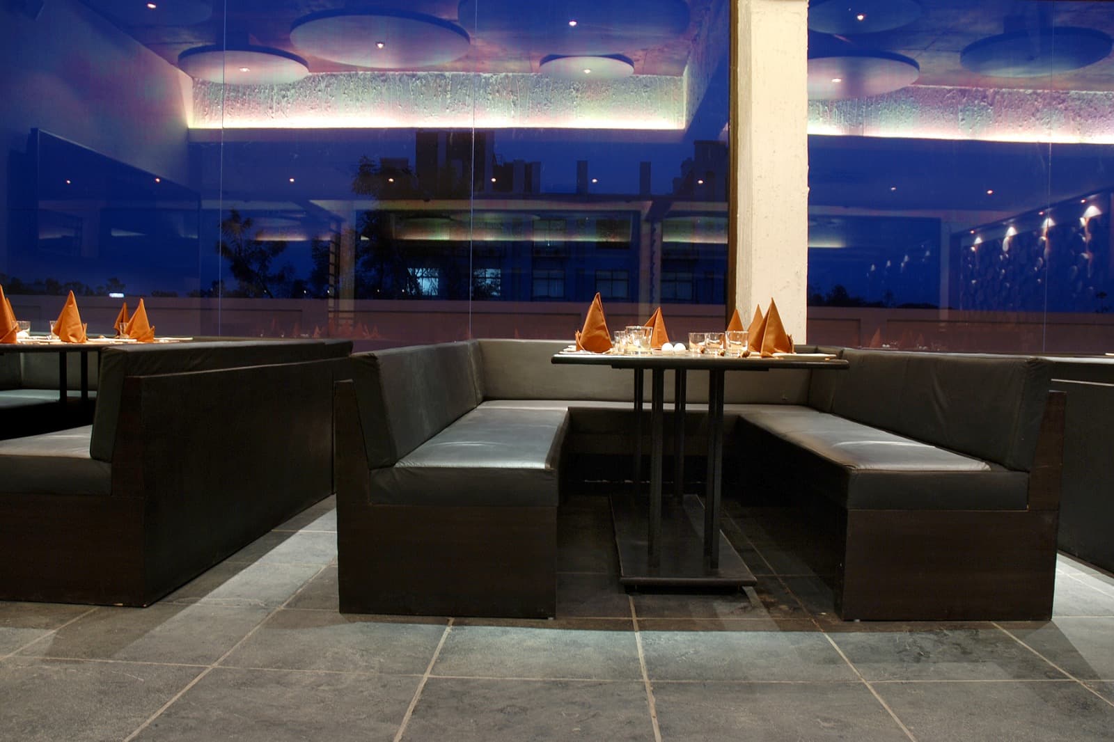 The Cooking Culture booth seating under the lit ceiling