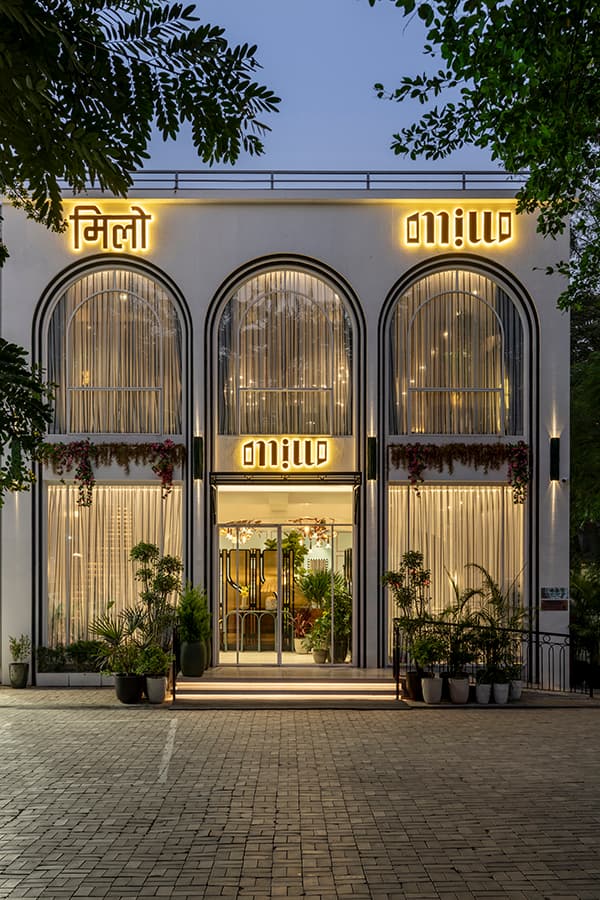Millo Nagpur facade at night with the illuminated Millo signage