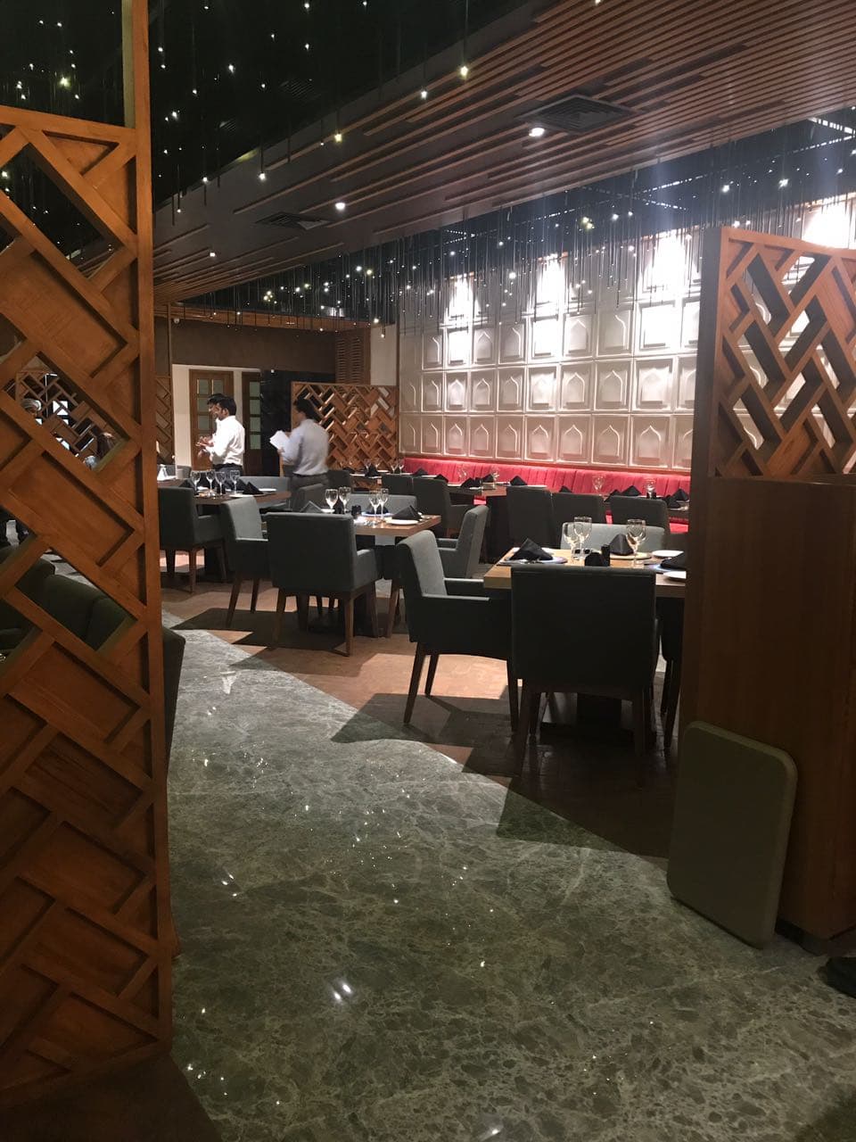 Timber lattice screen opening onto the dining room