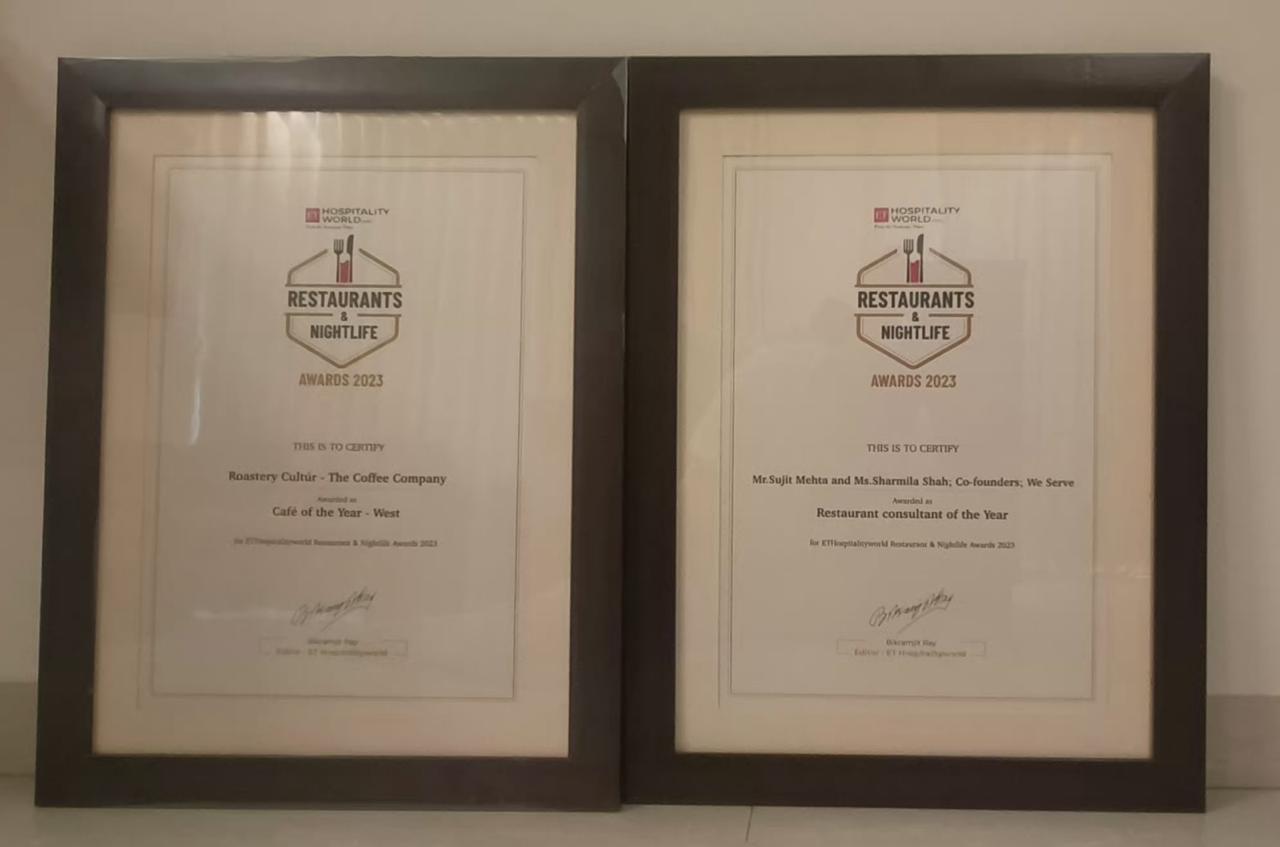 Two framed Restaurants & Nightlife Awards 2023 certificates