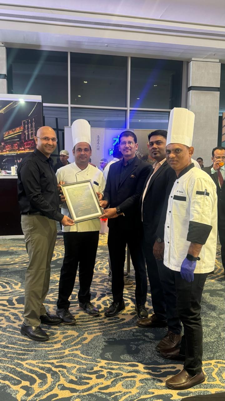 The team with chefs accepting a Times Food Award