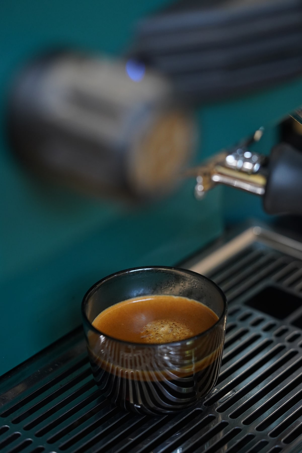 Coffeeverse coffee beneath an espresso machine