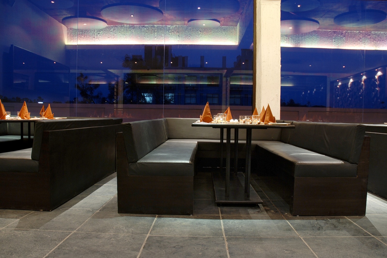 The Cooking Culture booth seating under the lit ceiling