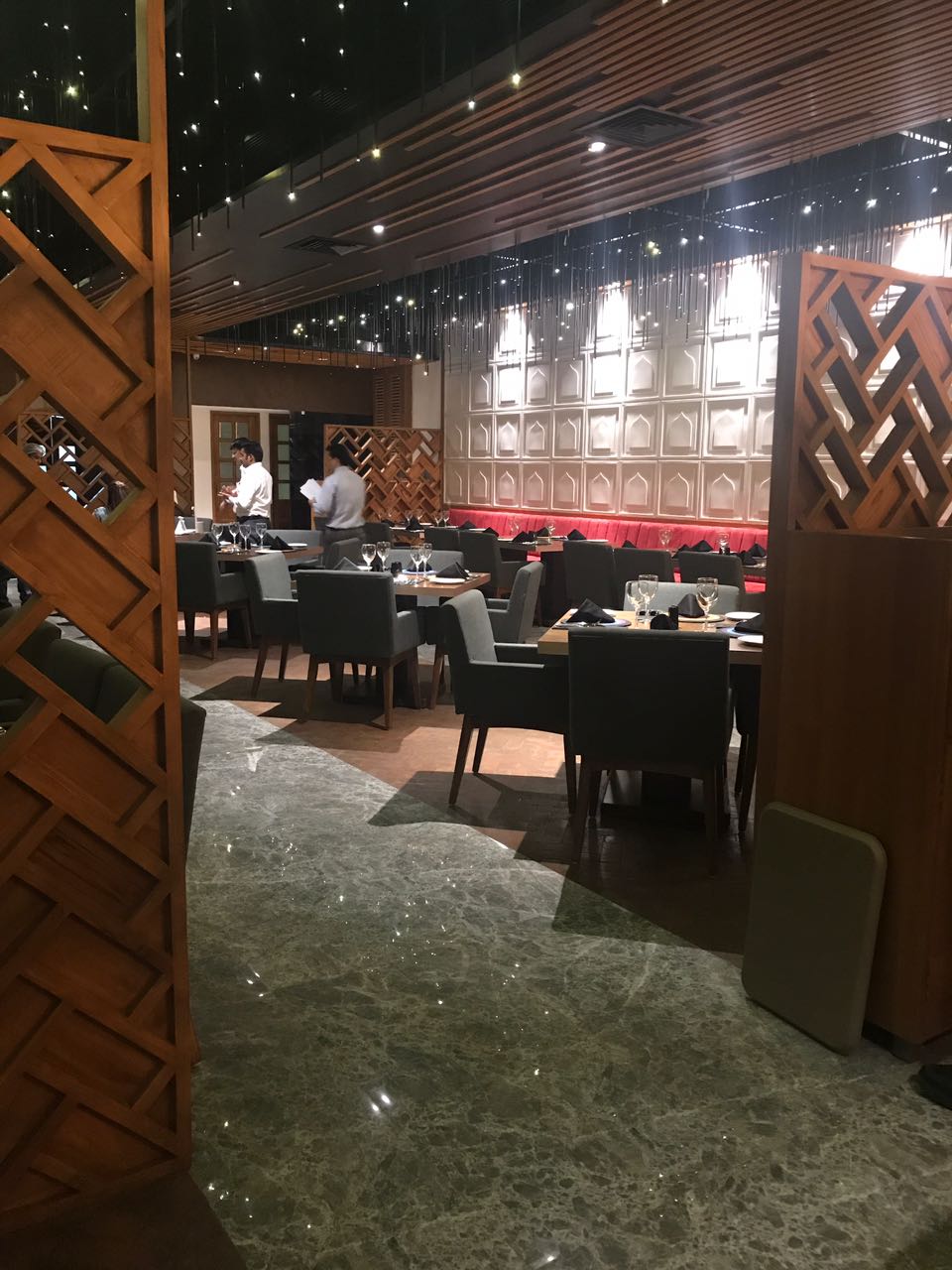 Timber lattice screen opening onto the dining room