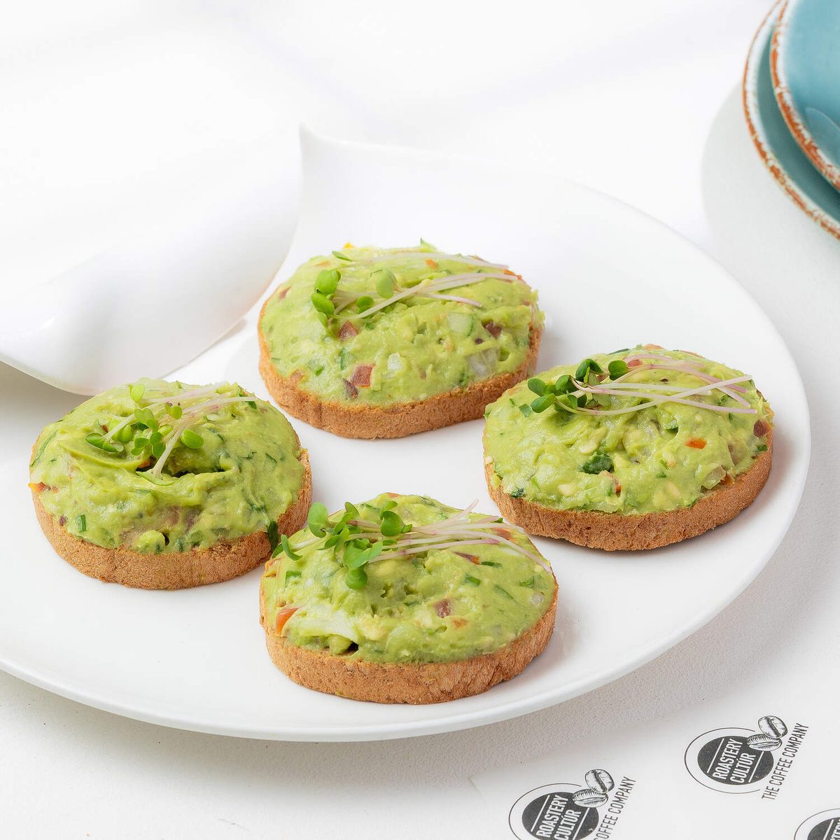 Avocado crostini, plated for service